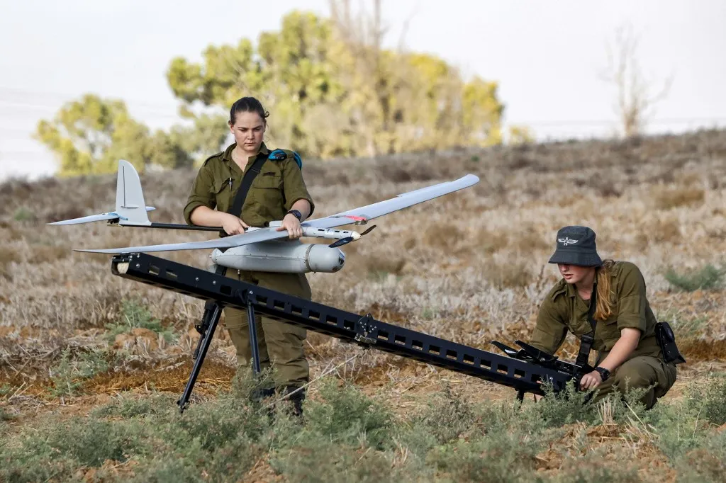 Israeli soldiers preparing an Elbit Systems Skylark I surveillance drone near the border with the Gaza Strip in southern Israel on Aug. 21, 2020 - source: AFP / Jack Guez / Getty Images
