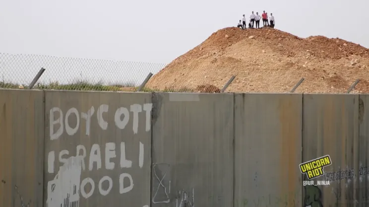 grafitti on the "Wall of Apartheid" in the West Bank - retrieved from Unicorn Riot (@ur_ninja)